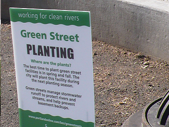 A photograph of a Green Street Planting sign in Portland, Oregon (USA)